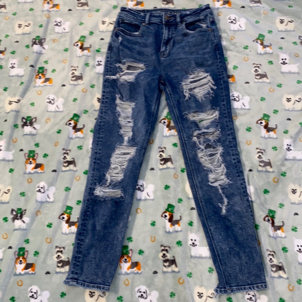 American Eagle super distressed high rise mom jeans